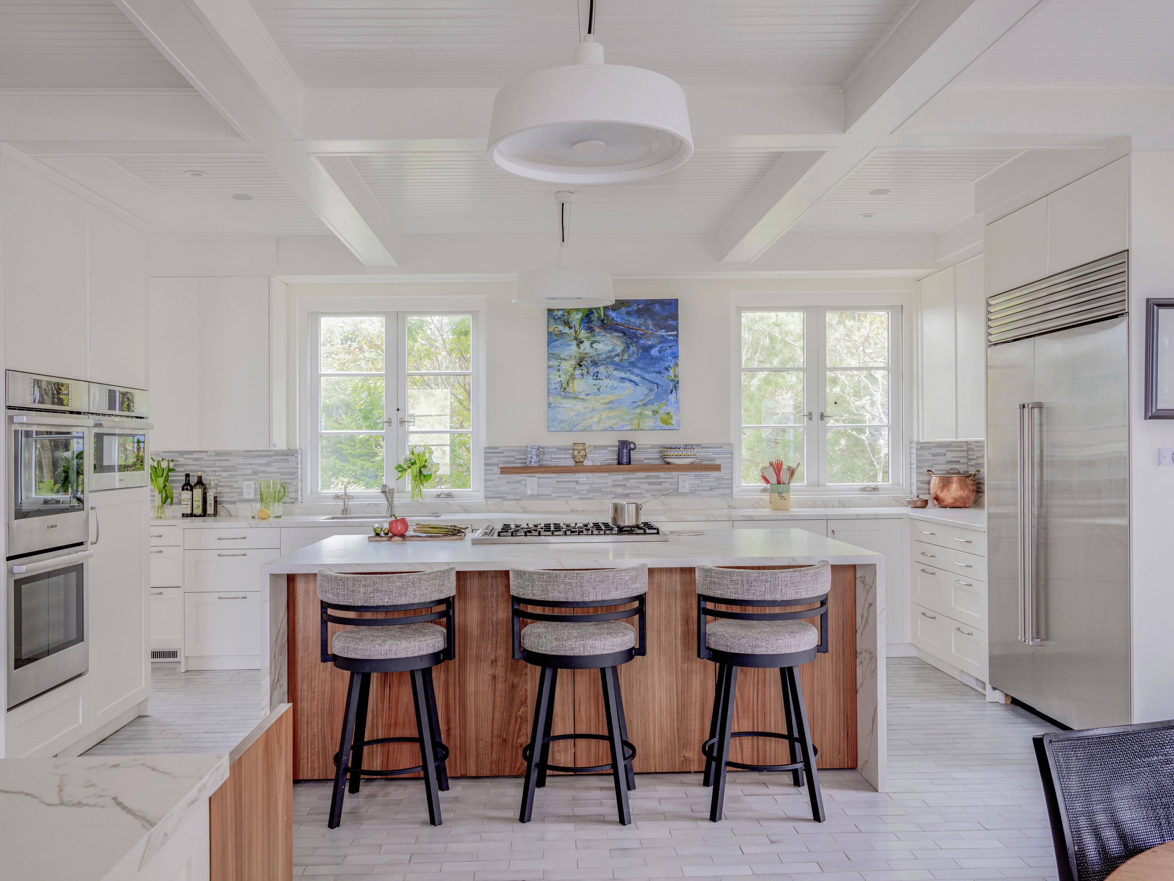 kitchen island view with artwork